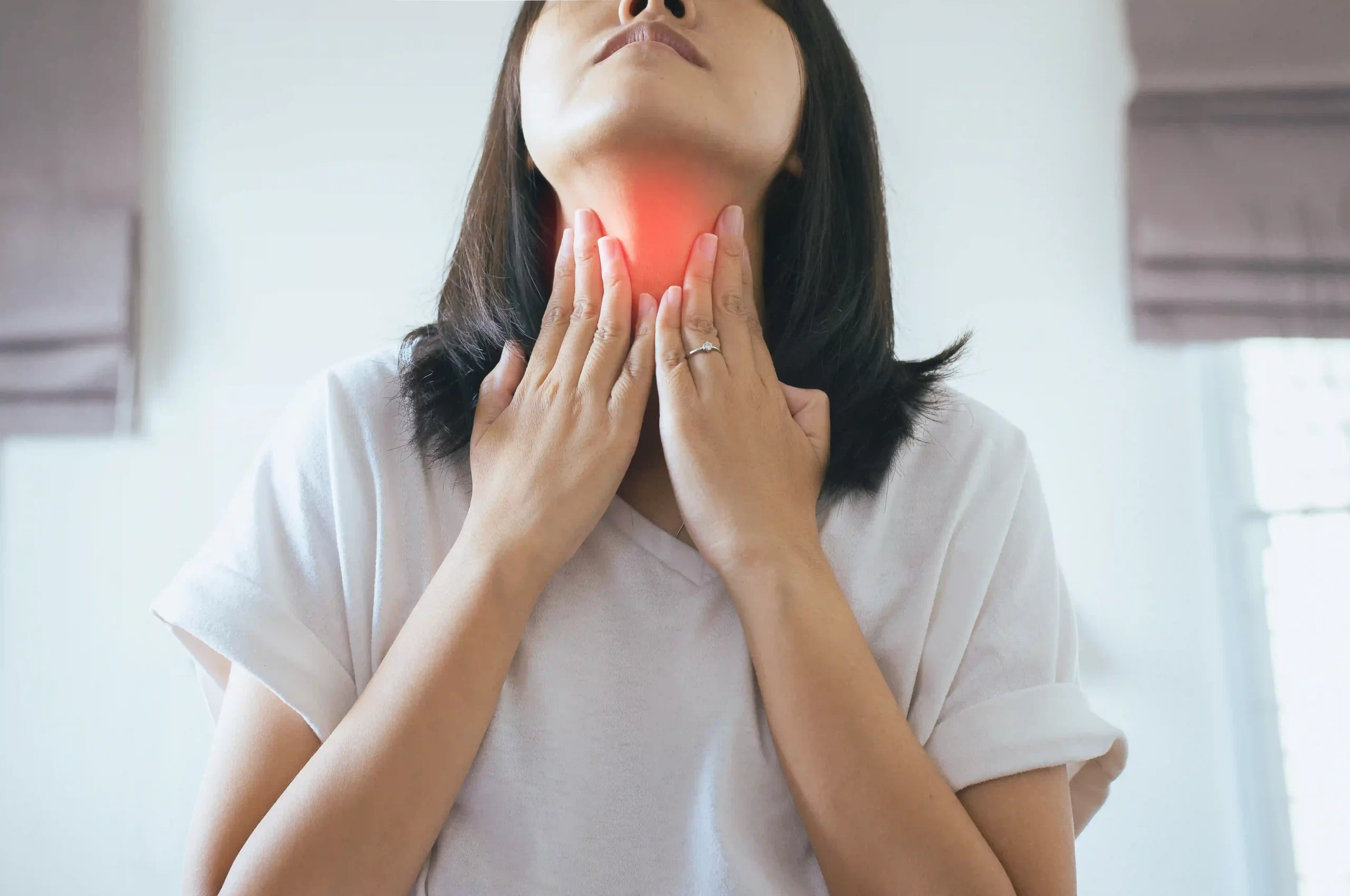lady experiencing symptoms of silent reflux