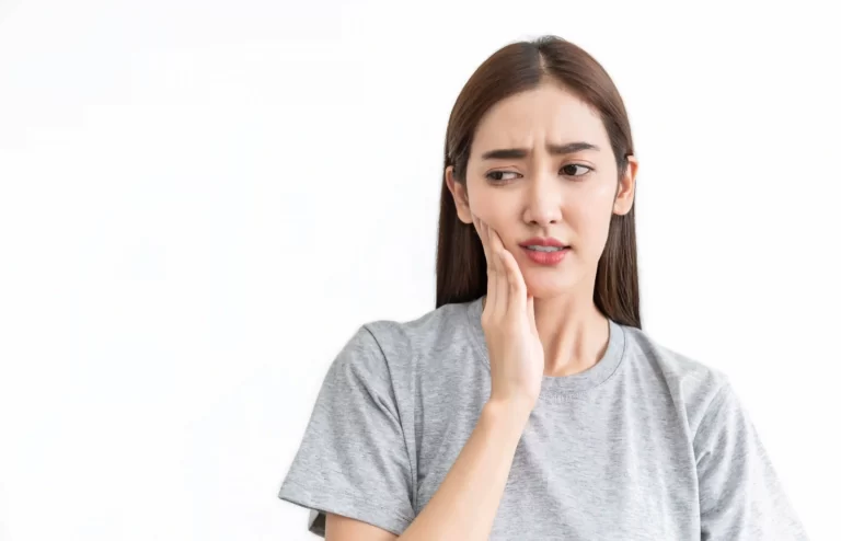female patient suffering from salivary gland pain