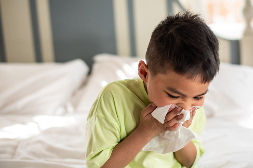Child blowing their nose