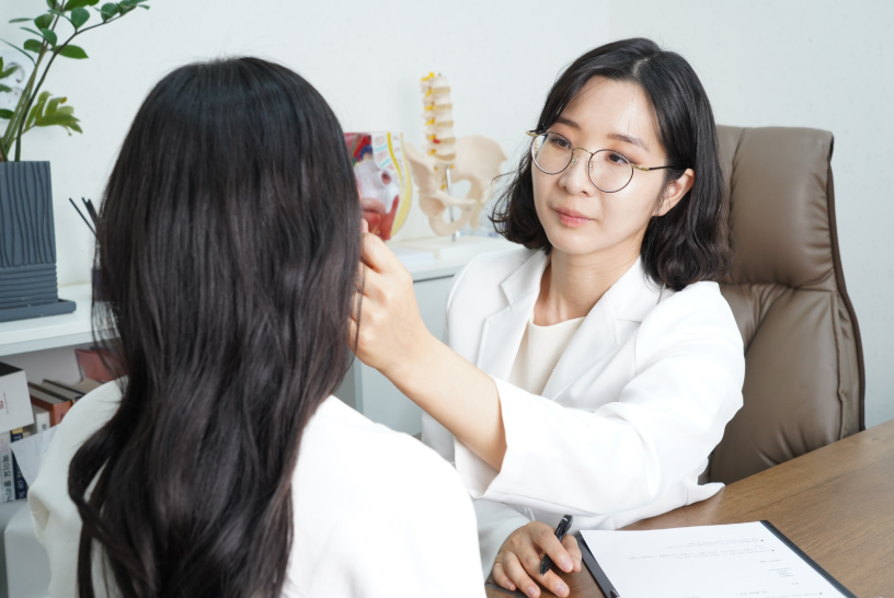 Doctor examining patient